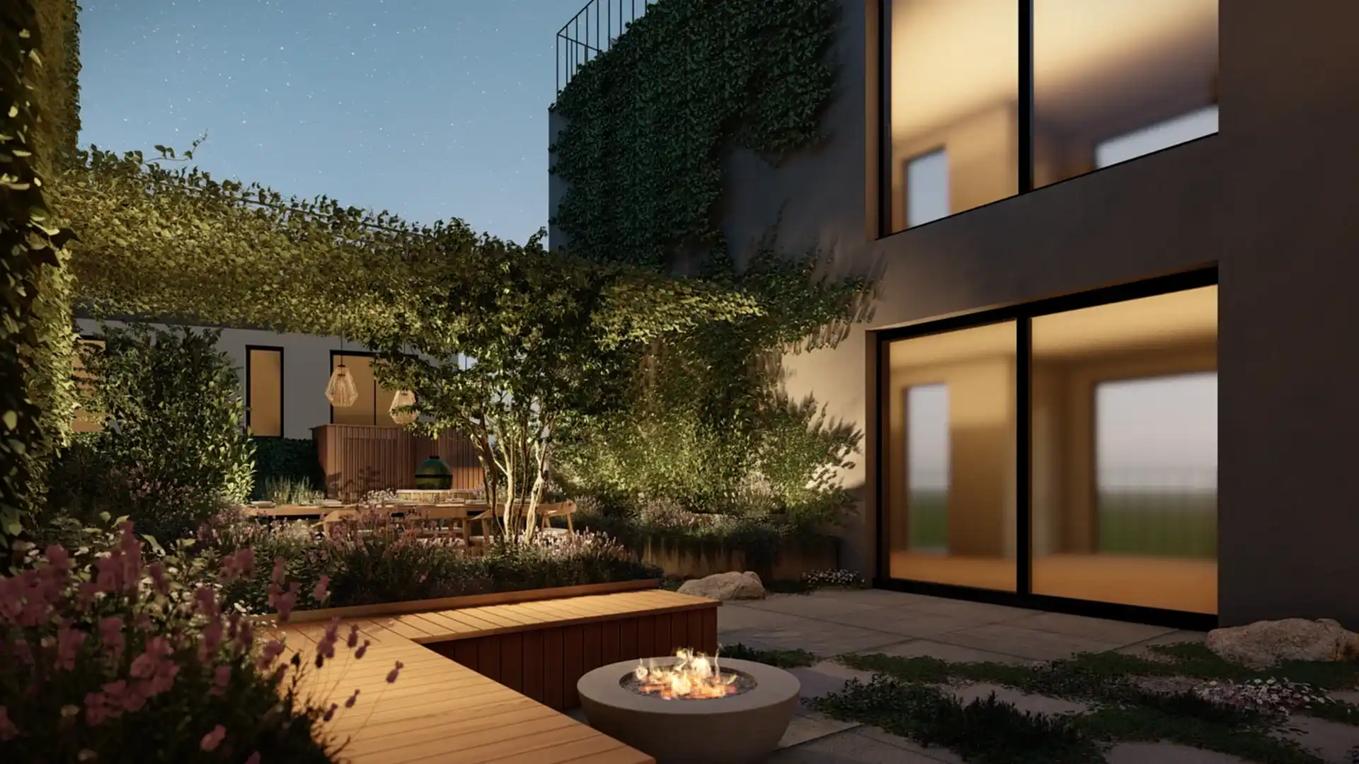 a patio with a fire pit and trees in front of a building