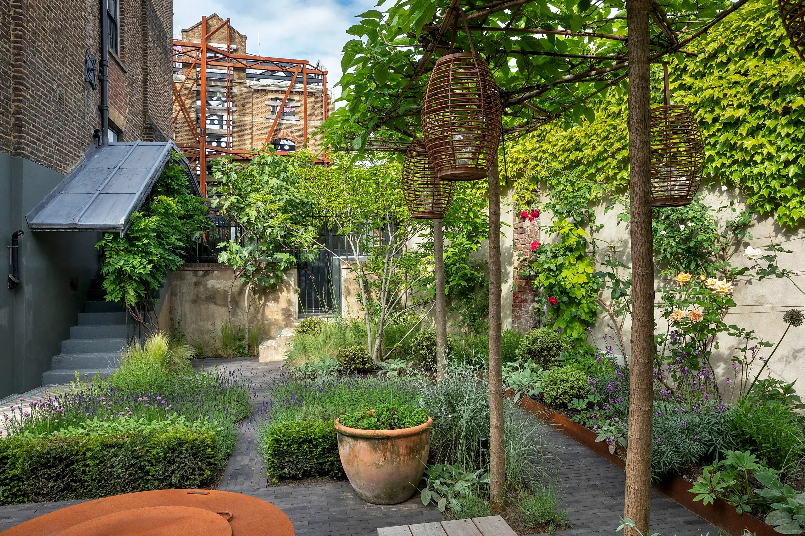 The walled garden of a grade ii listed building in London