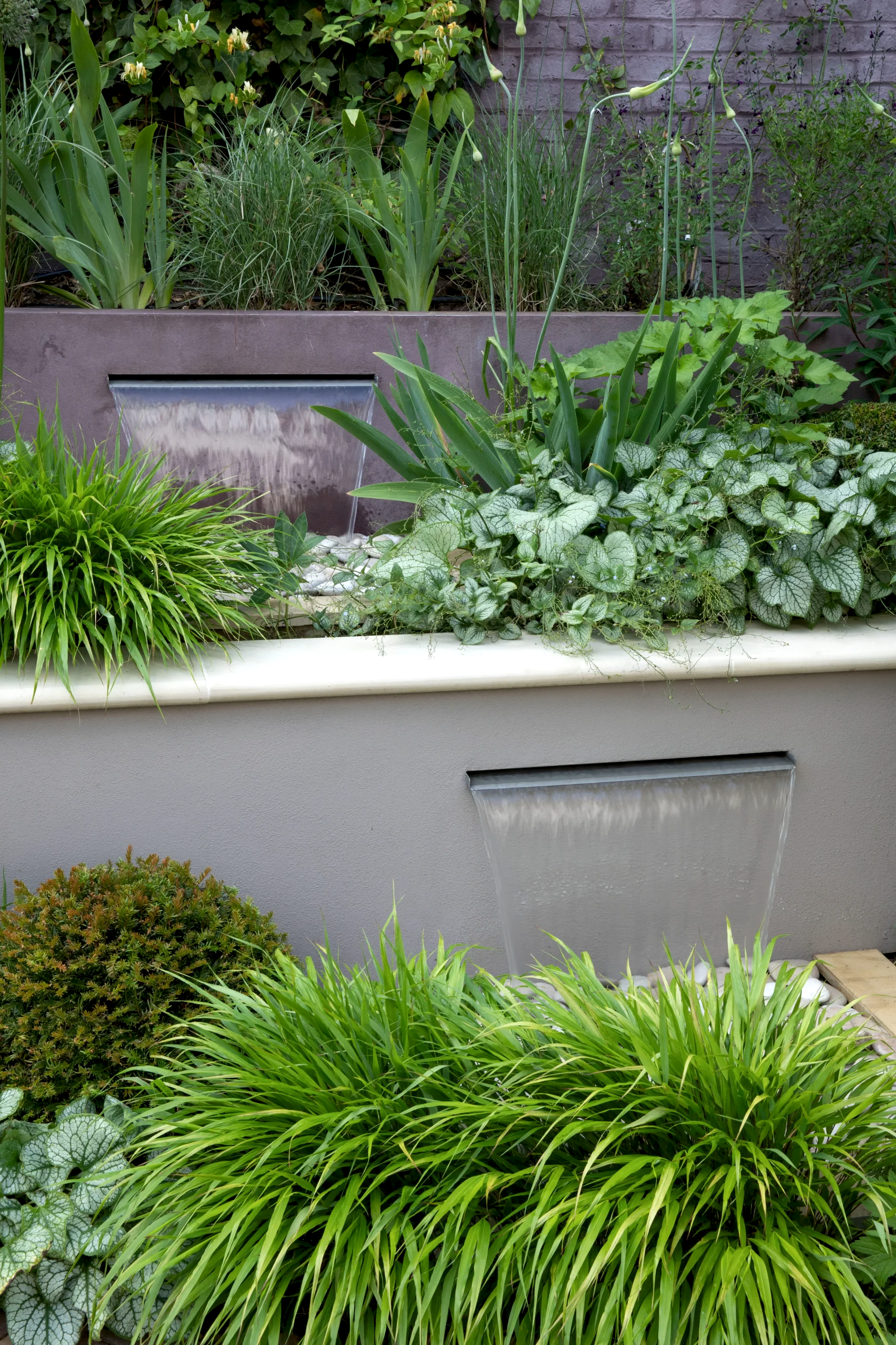 a water fountain in a garden