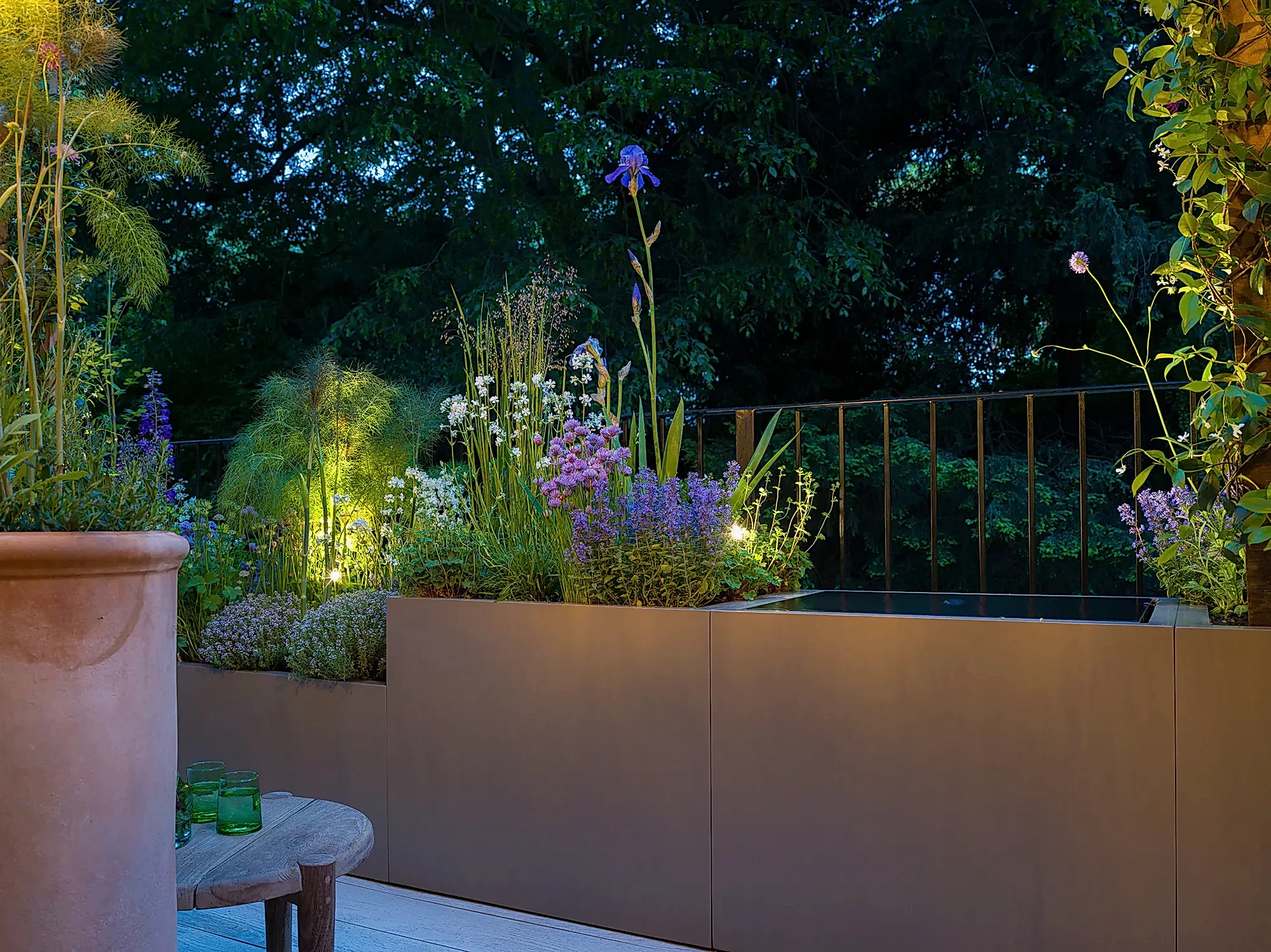 Terrace balcony garden planting and planters designed for wildlife and scent with water feature