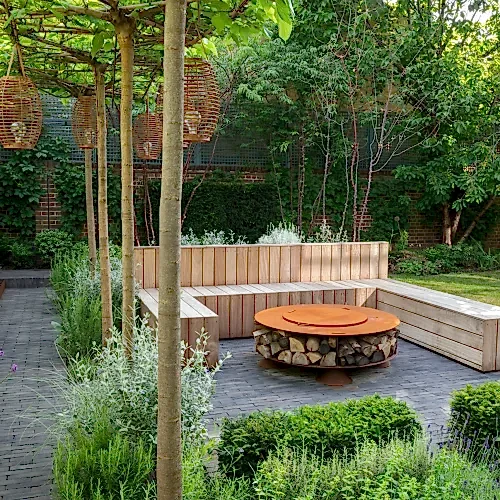 Built in garden seating in a London garden with trees