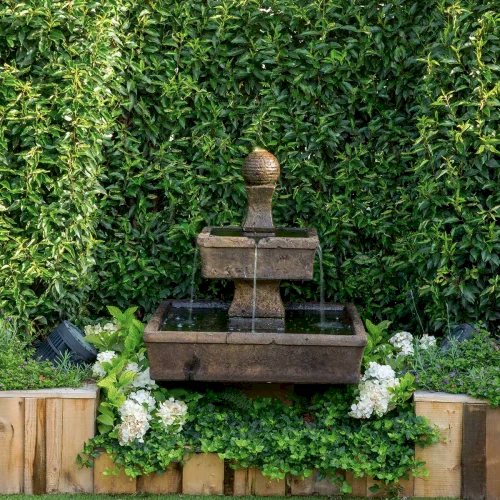 London event garden design with water feature and formal hedges for drinks reception