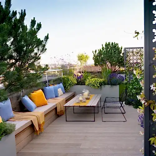 a patio with a table and chairs