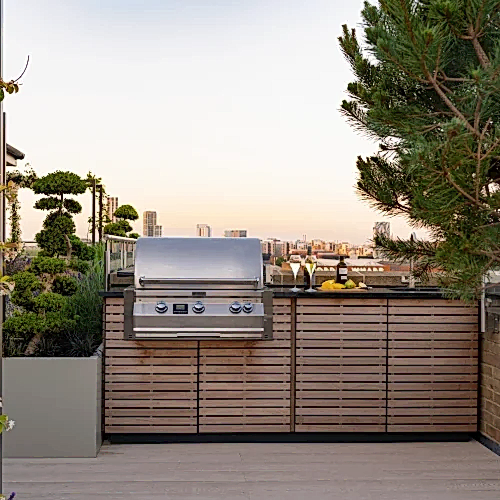 a barbecue on a deck