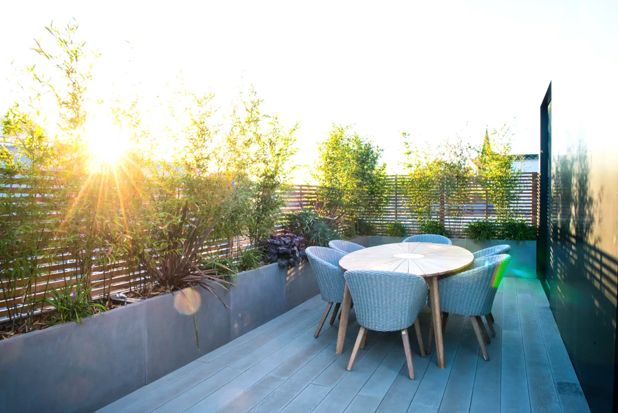 a table and chairs on a deck